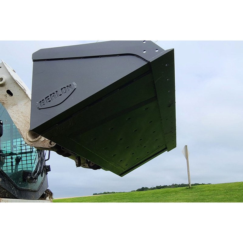 Berlon Industries BEL extended lip skid steer bucket raised on a skid steer