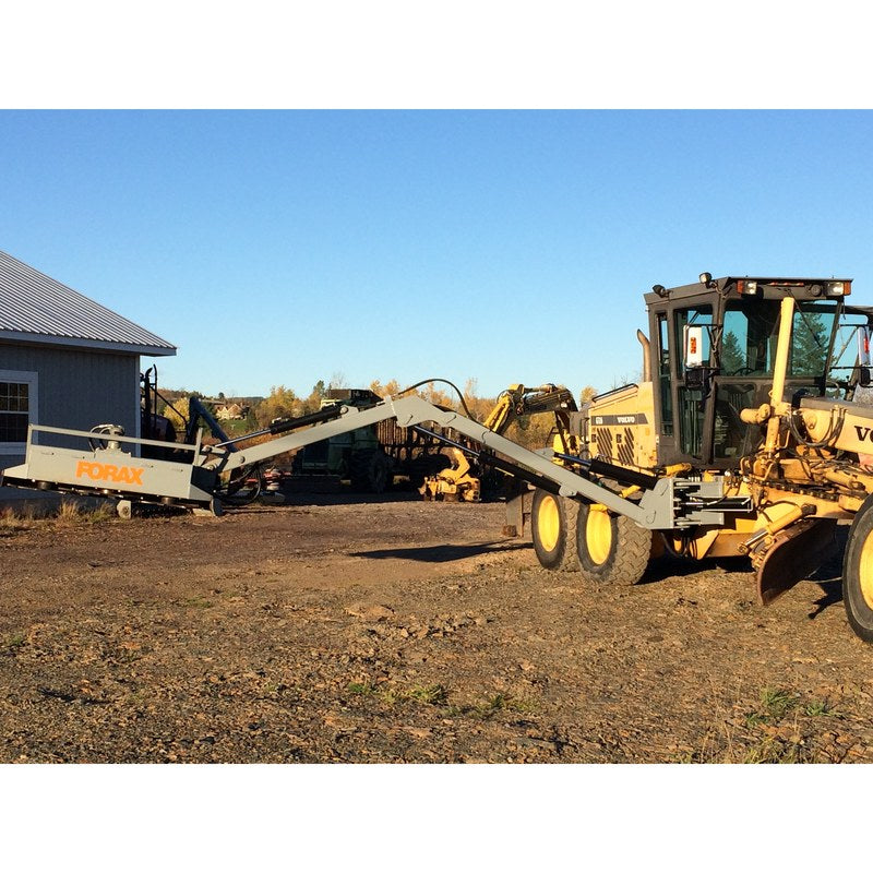 Forax Equipment grader implement boom reaching out to the side of a road grader with a 72 inch head