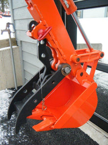 Amulet MT-1 Micro Thumb installed on a mini excavator