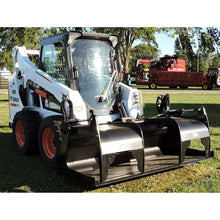 Berlon Industries BELHDGR heavy duty grapple bucket on a Bobcat skid steer