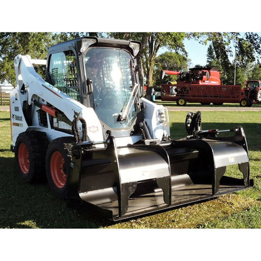 Berlon Industries BELHDGR heavy duty grapple bucket on a Bobcat skid steer
