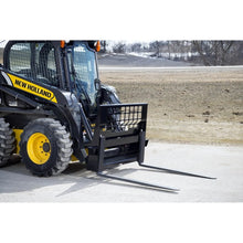 Berlon Industries Class II pallet forks on a New Holland skid steer