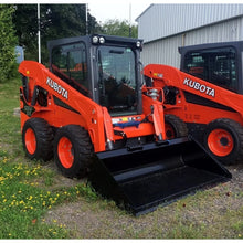 Berlon Industries BEL extended lip bucket on a Kubota skid steer