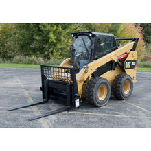 Berlon Industries Class III heavy duty pallet forks on a CAT skid steer