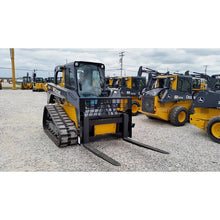 Berlon Industries Class III pallet forks on a compact track loader