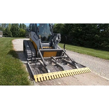 Berlon Industries land plane grading a gravel drive on a John Deere compact track loader