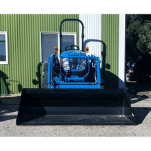Berlon Industries B Series low profile bucket on a compact tractor loader