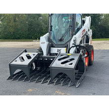 Berlon Industries medium duty grapple on a Bobcat skid steer, front view