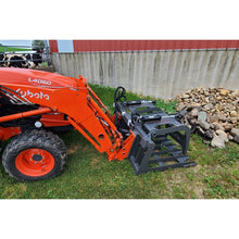 Berlon Industries medium duty grapple on a Kubota tractor loader