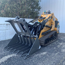Berlon Industries MIGR mini grapple open on a Vermeer mini skid steer