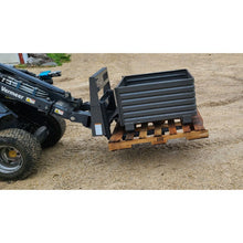 Berlon Industries mini pallet forks carrying a steel bin on a pallet