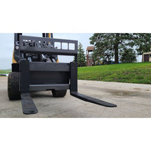 Berlon Industries mini pallet forks on a compact loader