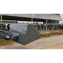 Berlon Industries MISLMB bucket pushing feed in a cattle barn
