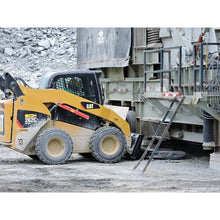 Berlon Industries MLB material long bucket on a CAT skid steer at a quarry conveyor