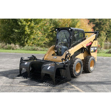 Berlon Industries SKLGR grapple on a CAT skid steer