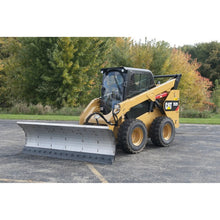 Berlon Industries snow blade on a CAT skid steer in a parking lot