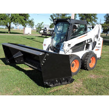 Berlon Industries snow pusher on a Bobcat skid steer