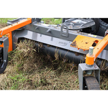 Berlon Industries soil conditioner drum breaking up sod, close up