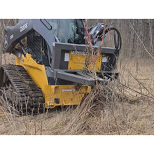 Berlon Industries tree puller working in brush on a compact track loader