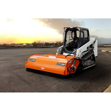 Broce BBA72P pick up broom on a compact track loader in a parking lot at sunset, front view