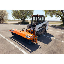 Broce BBA96H hydraulic skid steer broom angled on a compact track loader in a parking lot, front right view