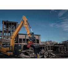 Connect Work Tools CG sorting grapple on an excavator at a building demolition site, working view