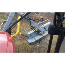 Forax Equipment groomer boom brush cutter head seen from the tractor cab