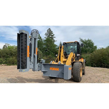 Forax Equipment loader mounted implement boom with the head raised upright on a wheel loader