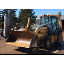 Forax Equipment offset tilt-up mount with the head tilted up beside a backhoe loader bucket