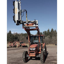 Forax Equipment tilt and extend mount with the head raised upright on a tractor loader