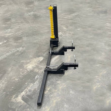 Bucket Beaver clamped to a skid steer bucket
