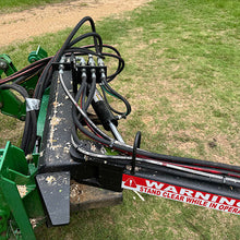 Junior Beaver JB 4TR mounted on a tractor loader