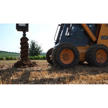 Lowe Manufacturing Classic auger drilling a hole on a skid steer