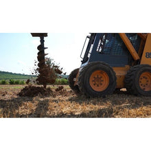 Lowe Manufacturing Classic auger lifting spoil out of a hole