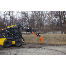 Lowe Manufacturing OptiBoom MAX with a trenching bucket on a New Holland skid steer