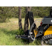 Maxx Attachments 20 inch Ranch Axe tree shear cutting a tree at ground level on a John Deere 325G compact track loader