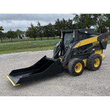 Maxx Attachments conveyor cleaning bucket on a New Holland skid steer