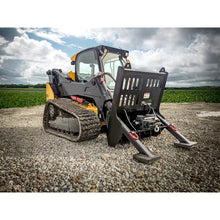 Maxx Attachments hydraulic recovery unit on a compact track loader on a gravel lot