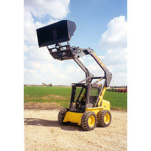Maxx Attachments rollout bucket raised to full height on a skid steer