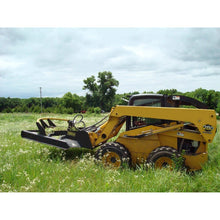 Maxx Attachments Vortex brush cutter on a John Deere skid steer in tall grass