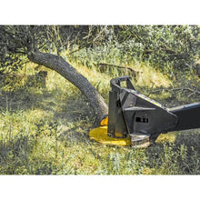 Maxx Attachments XD tree saw cutting a tree at ground level