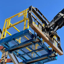 Star Industries safety work platform on telehandler forks