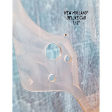 SHIELDS New Holland deluxe cab door window hardware holes, close-up view