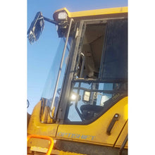 SHIELDS 1-piece front windshield on a Volvo wheel loader cab, side view