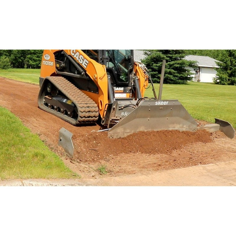 Skeer Side Plate Kit on a ProPlus grading blade spreading dirt with a compact track loader, front working view