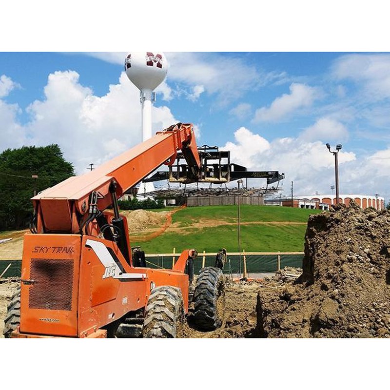 Star Industries wire mesh handler on a SkyTrak telehandler