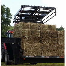 Top Dog Attachments bale accumulator stacking square bales on a trailer