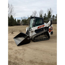 Top Dog Attachments dirt bucket on a Bobcat compact track loader