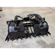 Top Dog Attachments extreme root grapple on the shop floor, rear view of the cylinders and hoses