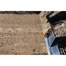 Top Dog Attachments land plane cutting edge in freshly graded soil